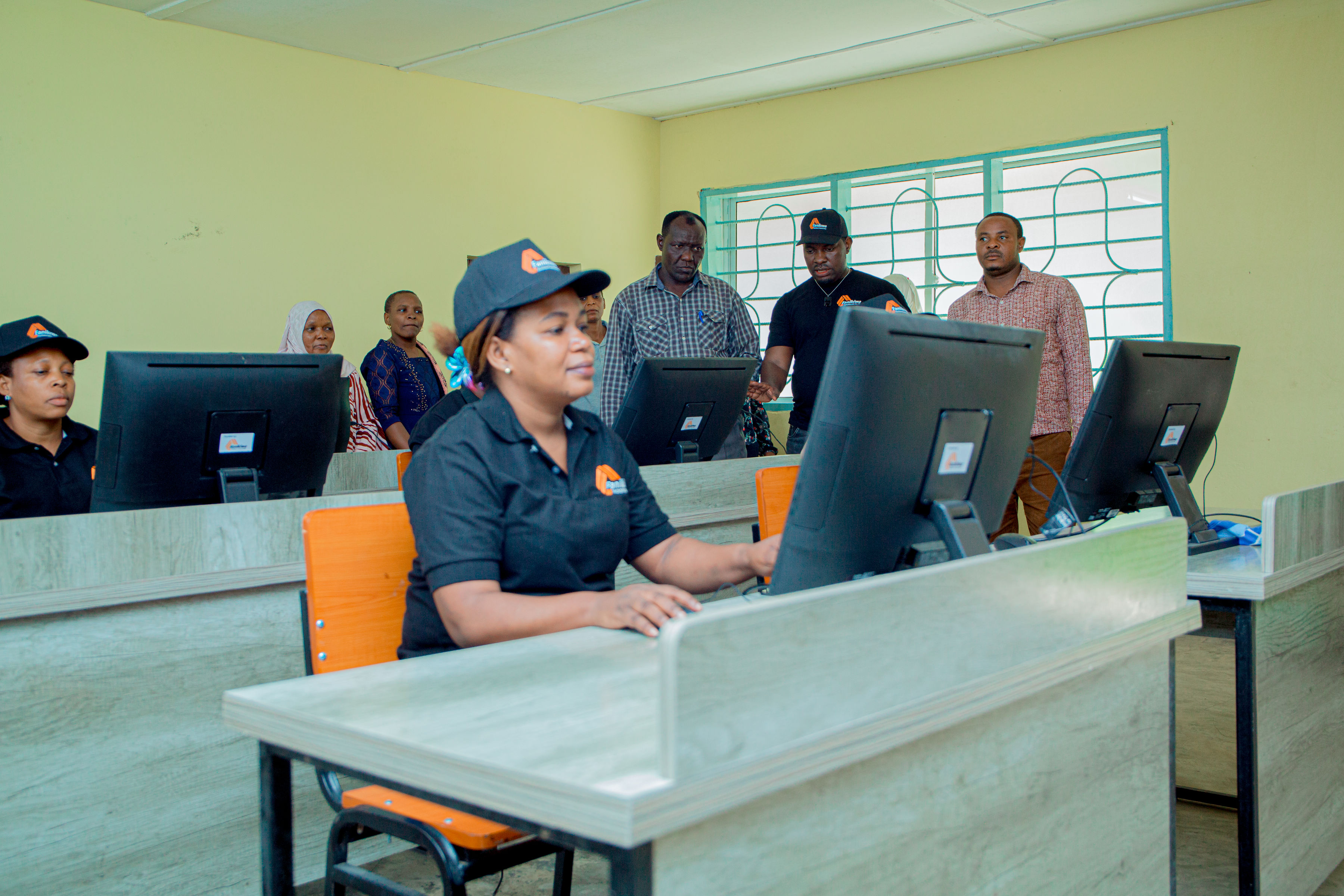 Handover of 10 computers, desks and chairs to kumbukumbu primary school
